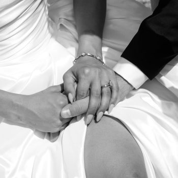 Bride and groom holding hands on their wedding day, captured at a Melbourne event planned by ARLAI Event Co