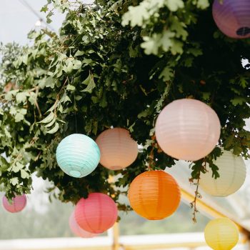 Elegant lantern wedding decor lighting up the reception venue.