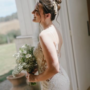 Bride holding floral bouquet at Montalto Winery wedding, styled by ARLAI Event Co Melbourne event stylist