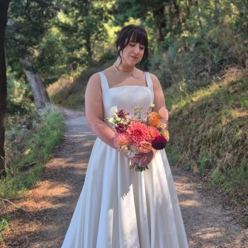Bride captured in a graceful solo portrait on her wedding day.