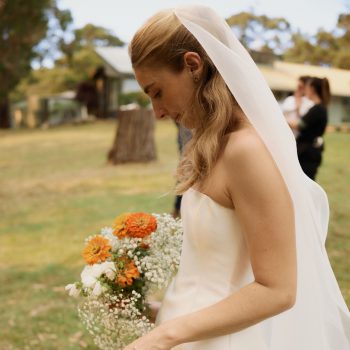 Bride walking gracefully through Runnymede Farm Lorne outdoor ceremony, coordinated by ARLAI Event Co Melbourne