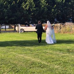 Bride and groom Chloe and Nic posing at their shed wedding