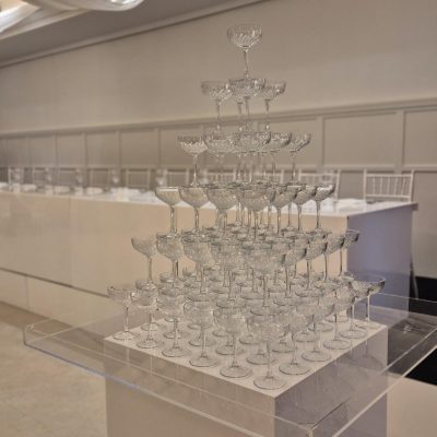 Classic champagne tower setup at a wedding reception