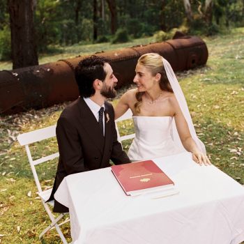 Bride and groom signing wedding documents at Runnymede Farm Lorne ceremony, ARLAI Event Co wedding coordinator