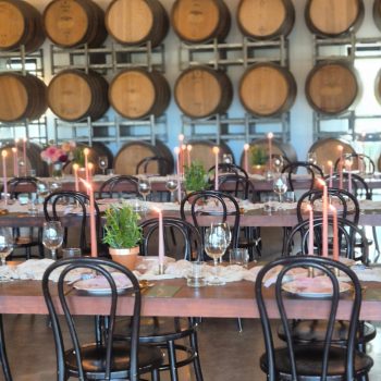Wedding dinner table beautifully styled with simple, elegant décor.