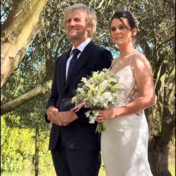 Father ready to walk his daughter down the aisle at her wedding.