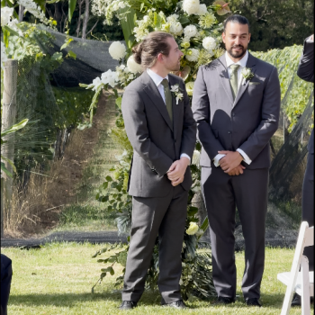 Groom standing at the altar as he awaits the bride.