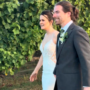 Smiling bride and groom