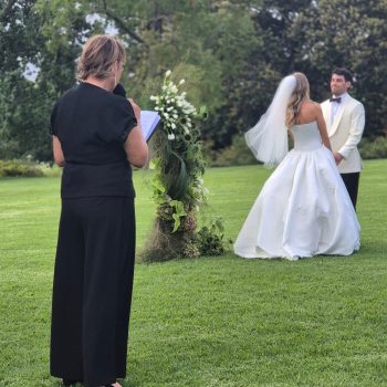 Heartfelt wedding ceremony reading scene with emotional guests and a meaningful, intimate atmosphere