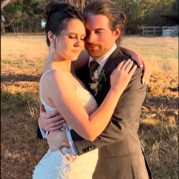 Couple sharing an intimate moment during wedding photos.