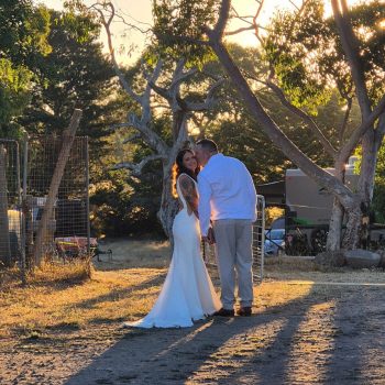 Bride and groom posing elegantly for a professional wedding portrait