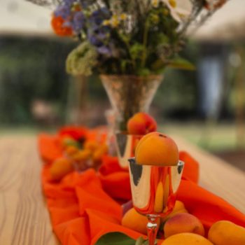 Rustic wedding table décor with seasonal fruits